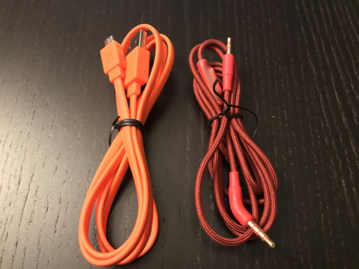 Included accessories are a microUSB charging cable and a 3.5mm cable.  There's no carrying case or a
