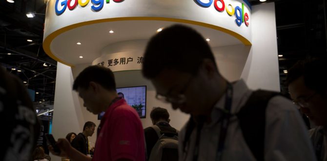 Visitors use their smartphones in front of a booth for Google 1 670x330 - Google Forays Into Hyperlocal News Through ‘Bulletin’ App